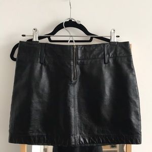 Black leather mini skirt